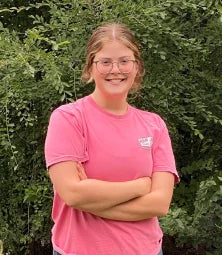 A Vireo Resources employee wearing a pink shirt.
