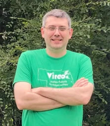 A Vireo Resources employee wearing a green shirt.